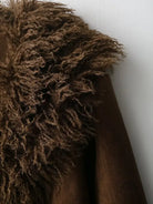 Elegant autumn fur effect coat with brown faux shearling blanket