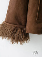 Elegant autumn fur effect brown suede jacket with fringed hem