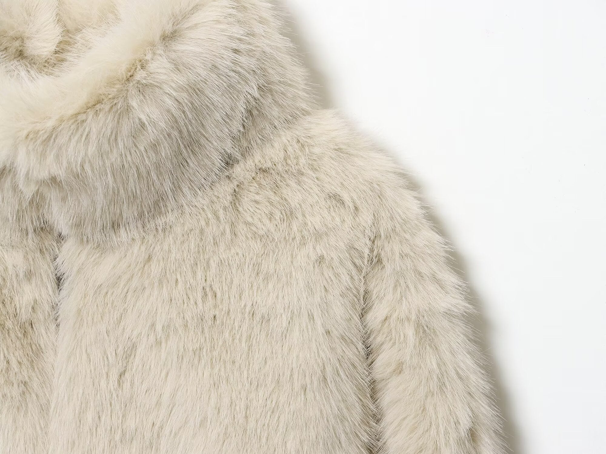 Cream faux fur jacket with hood and textured details
