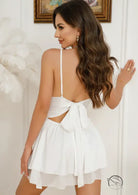 White backless mini dress with thin straps and bow waist in Langry fashion