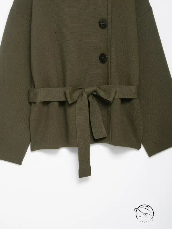 Olive green double-breasted trench coat with regular sleeve and tied waistband