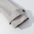 Gray cuff of loose unique design long sleeve coat with black buttons, langry fashion ملابس