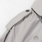 Light gray double-breasted langry fashion coat with black buttons