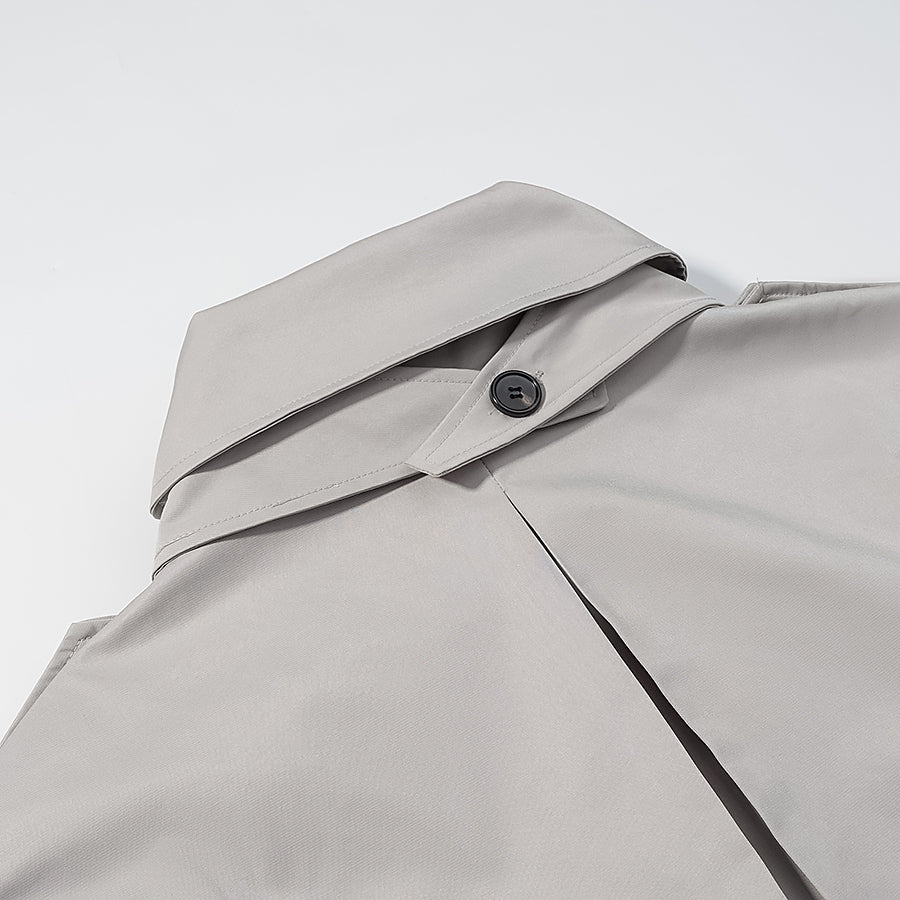 Light gray langry fashion shirt with black buttons in loose long sleeve coat design