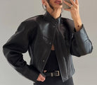 Stylish Langry faux leather jacket with cropped design, button closure, and pockets