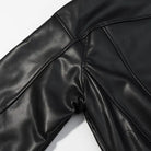 Stylish faux leather jacket with black shiny pants and elastic waistband