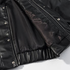 Stylish simple short faux leather jacket by Langry with silver zipper details