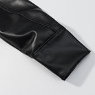 Black faux leather glove with textured palm in Langry leather jacket