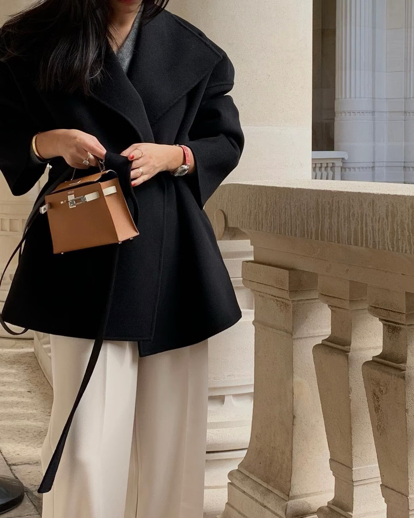 Elegant Langry fashion woolen coat with brown Hermes Kelly bag