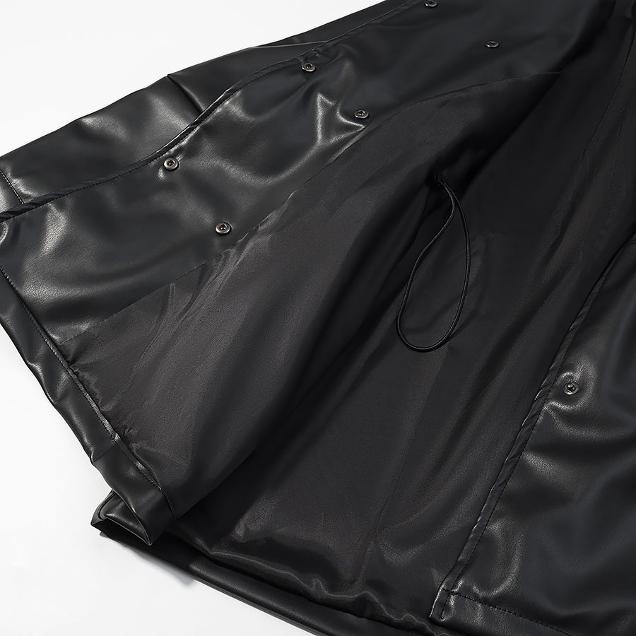 Black glossy faux leather Langry raincoat with drawstring hem