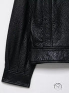 Elegant langry faux leather bomber jacket with textured surface and rolled cuffs