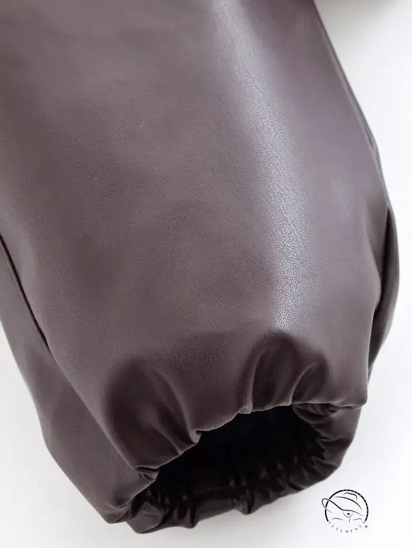 Trendy langry fashion jacket with brown leather glove and elastic wristband