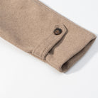 Elegant beige woolen wrist warmer with button closure for langry fashion coats