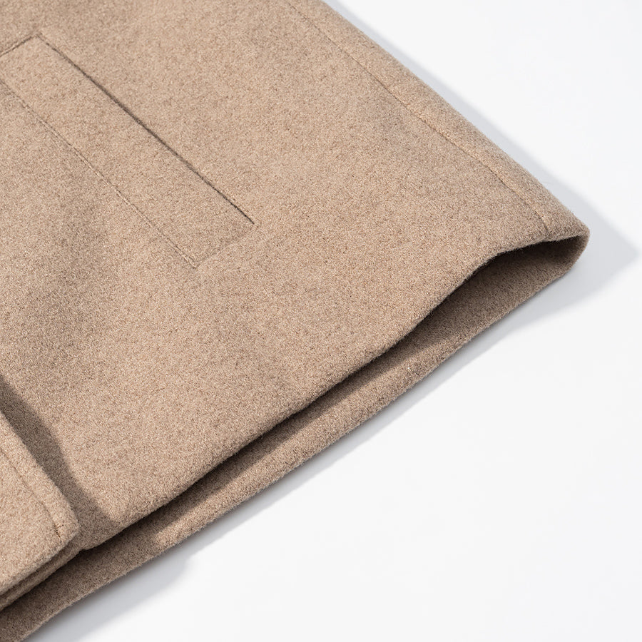 Elegant langry beige woolen skirt with pockets, textured surface for autumn fashion