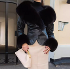 Langry fashion black leather fur-trimmed jacket with gold hardware and cream skirt