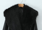 Langry black leather fur-trimmed winter jacket on wooden hanger