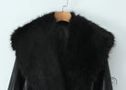 Langry fashion black leather fur-trimmed jacket on wooden hanger