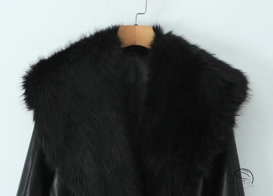 Langry fashion black leather fur-trimmed jacket on wooden hanger