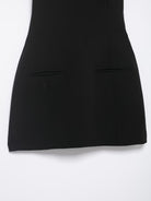 Black Langry fashion mini skirt with front flap pockets in enchanting dress