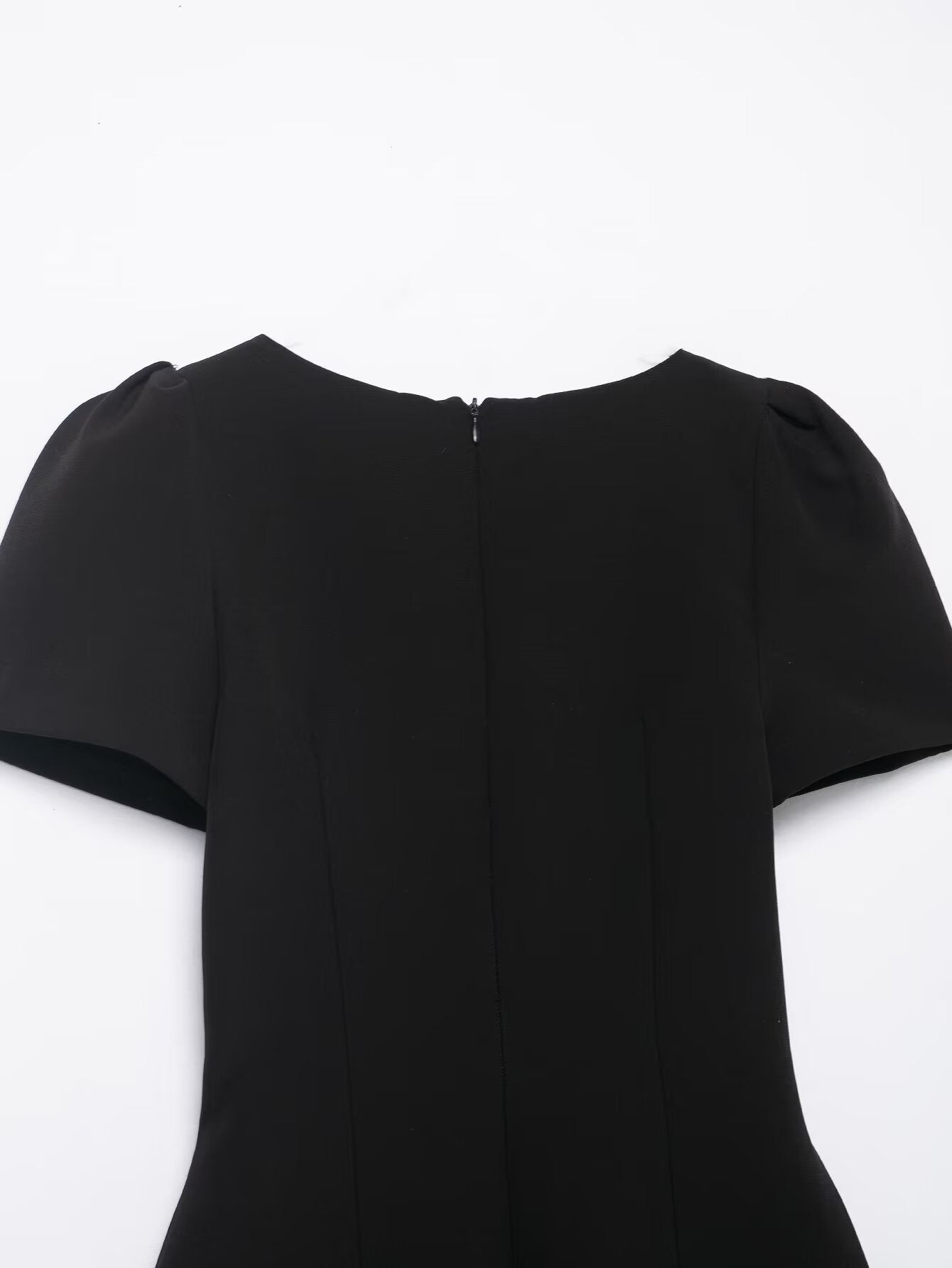 Enchanting Langry fashion black dress with short puffed sleeves and back zipper