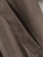 Close-up of Warm & Cozy langry suede jacket in fashion ملابس