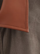 Tan leather wallet corner with stitched edges in Langry fashion ملابس