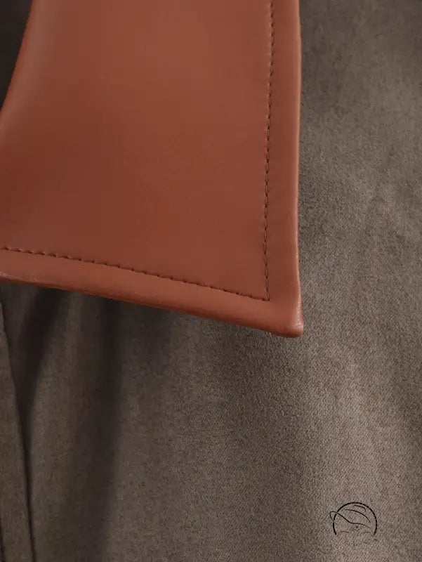 Tan leather wallet corner with stitched edges in Langry fashion ملابس