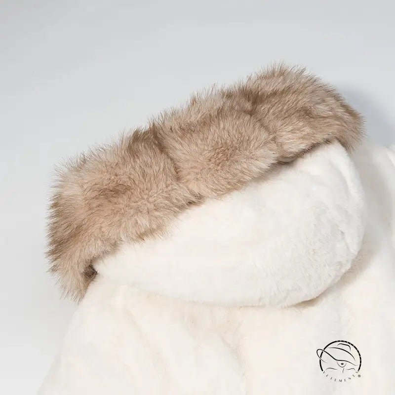 White faux fur coat with tan plush-lined hood in Langry fashion