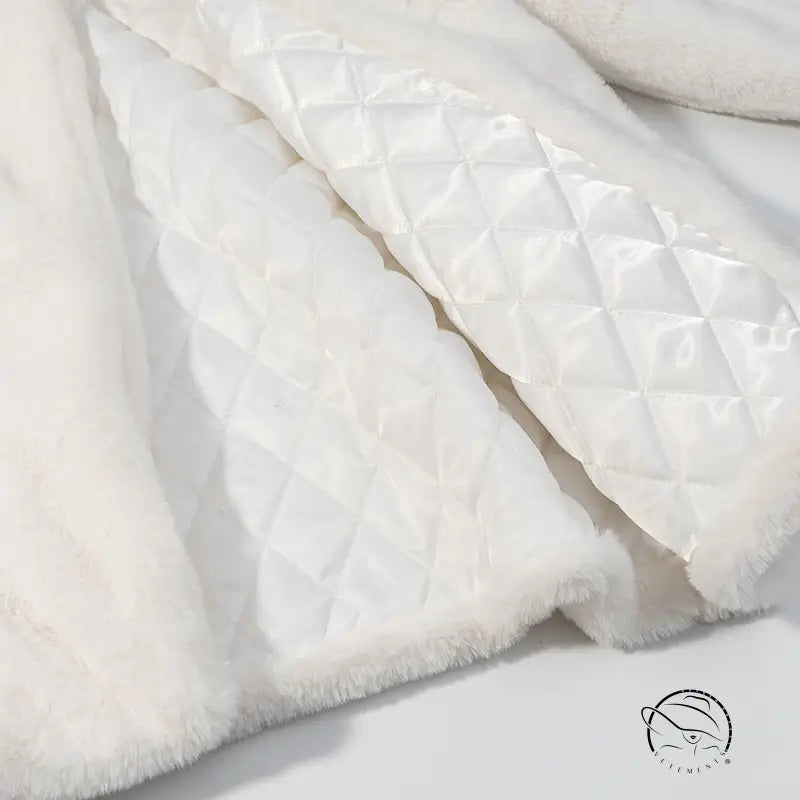 White faux fur coat with quilted satin lining and velvet lace-up trim