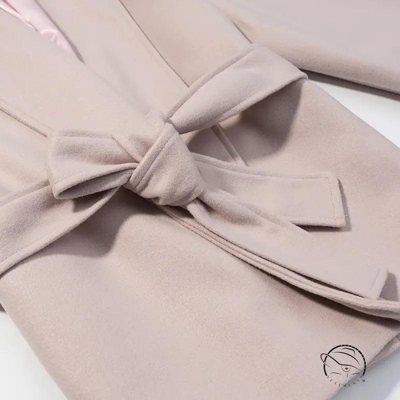 Elegant langry blush pink wool coat with self-tie belt bow