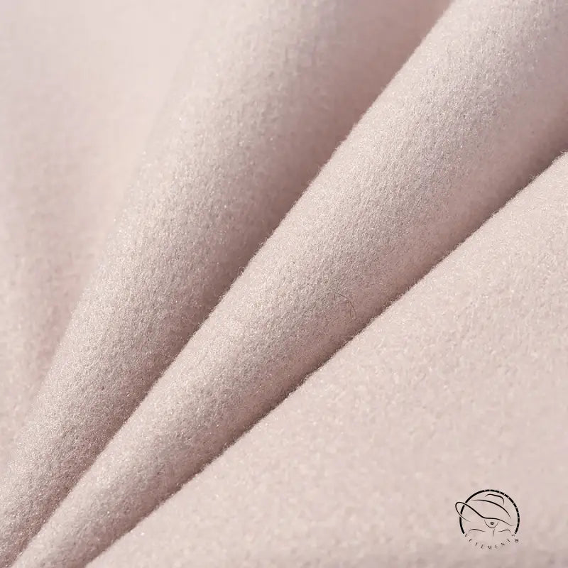 Elegant langry fashion coat in soft blush suede with velvety texture