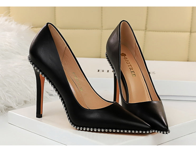 Black studded high heels from Party Thinner High Heels, a stylish choice for Langry fashion