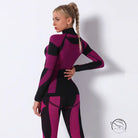 Seamless knitted turtleneck yoga top in magenta and black with geometric patterns