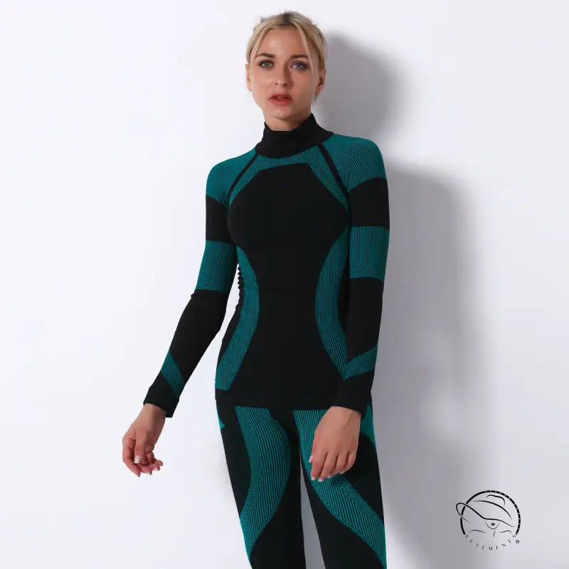 Black and teal seamless knitted turtleneck yoga top with geometric neoprene pattern