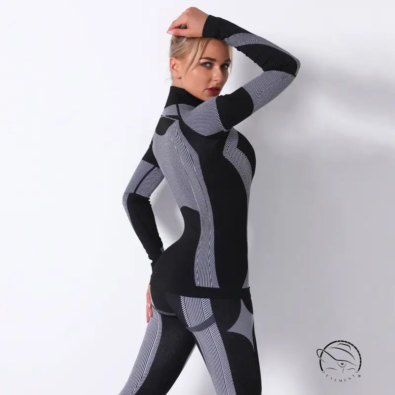 Seamless knitted turtleneck yoga top in black and gray pattern with long sleeves