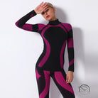 Seamless knitted turtleneck yoga top in black and pink geometric neoprene pattern