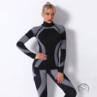 Seamless knitted turtleneck yoga top in black and gray geometric pattern