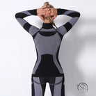 Black and gray seamless knitted turtleneck yoga top with geometric pattern