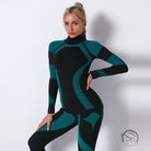 Black and teal seamless knitted turtleneck yoga top with geometric neoprene pattern