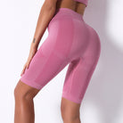Pink athletic shorts from Seamless Knit Breathable Striped Shorts Yoga Pants in fashion ملابس