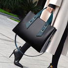 Langry fashion high-grade soft leather handbag with teal accents and silver hardware, inspired by Hermes Birkin design