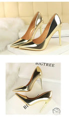 Elegant gold stiletto heels in fashionable metal high heels design