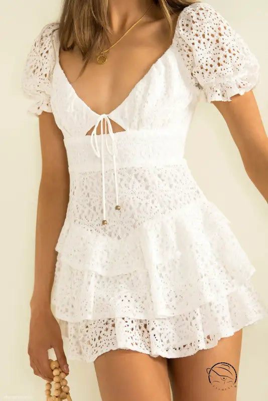 Elegant short lace white mini dress in lace up design