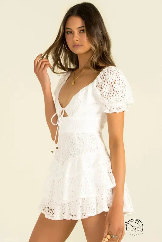 Elegant short lace white mini dress with lace-up details