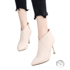 Cream-colored suede fashion European boots with pointed toe and high heel