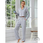 Gray two-piece langry home wear with white piping and drawstring waist