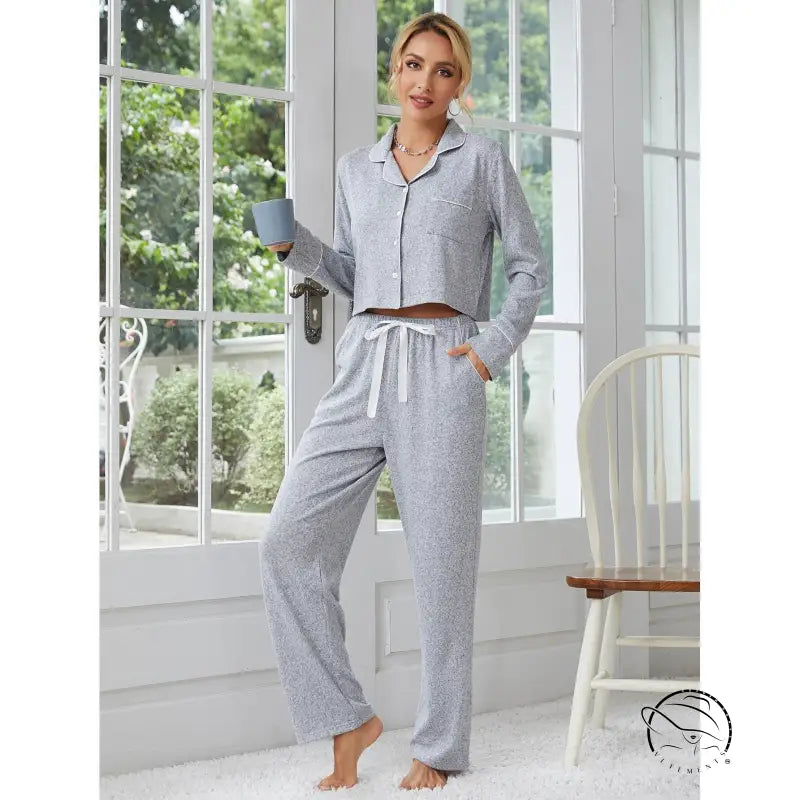 Gray two-piece langry home wear with white piping and drawstring waist