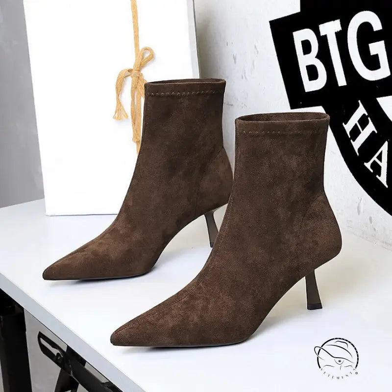 Brown suede ankle boots with pointed toes and low heels from Langry fashion
