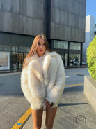 Langry cream faux fur oversized coat with high collar and pockets