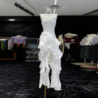 White ruffled evening gown with beaded bodice in enchanting red fashion